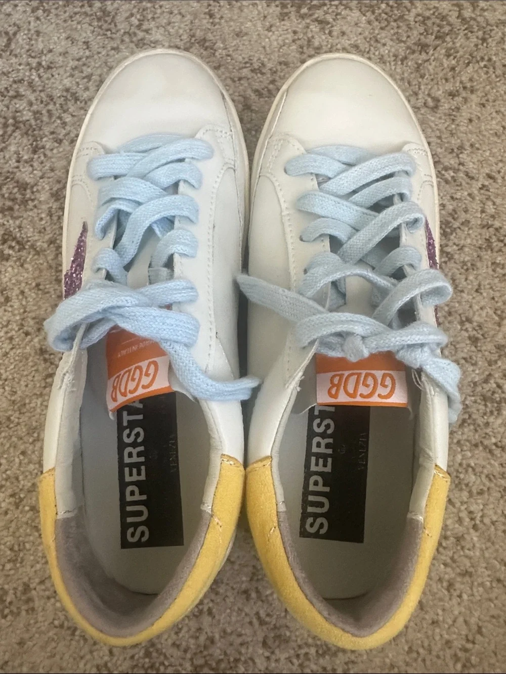 Golden Goose featuring white